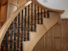 Helical staircase with metal balusters